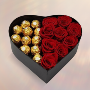 valentines or anniversary, red roses and chocolates fill the heart box